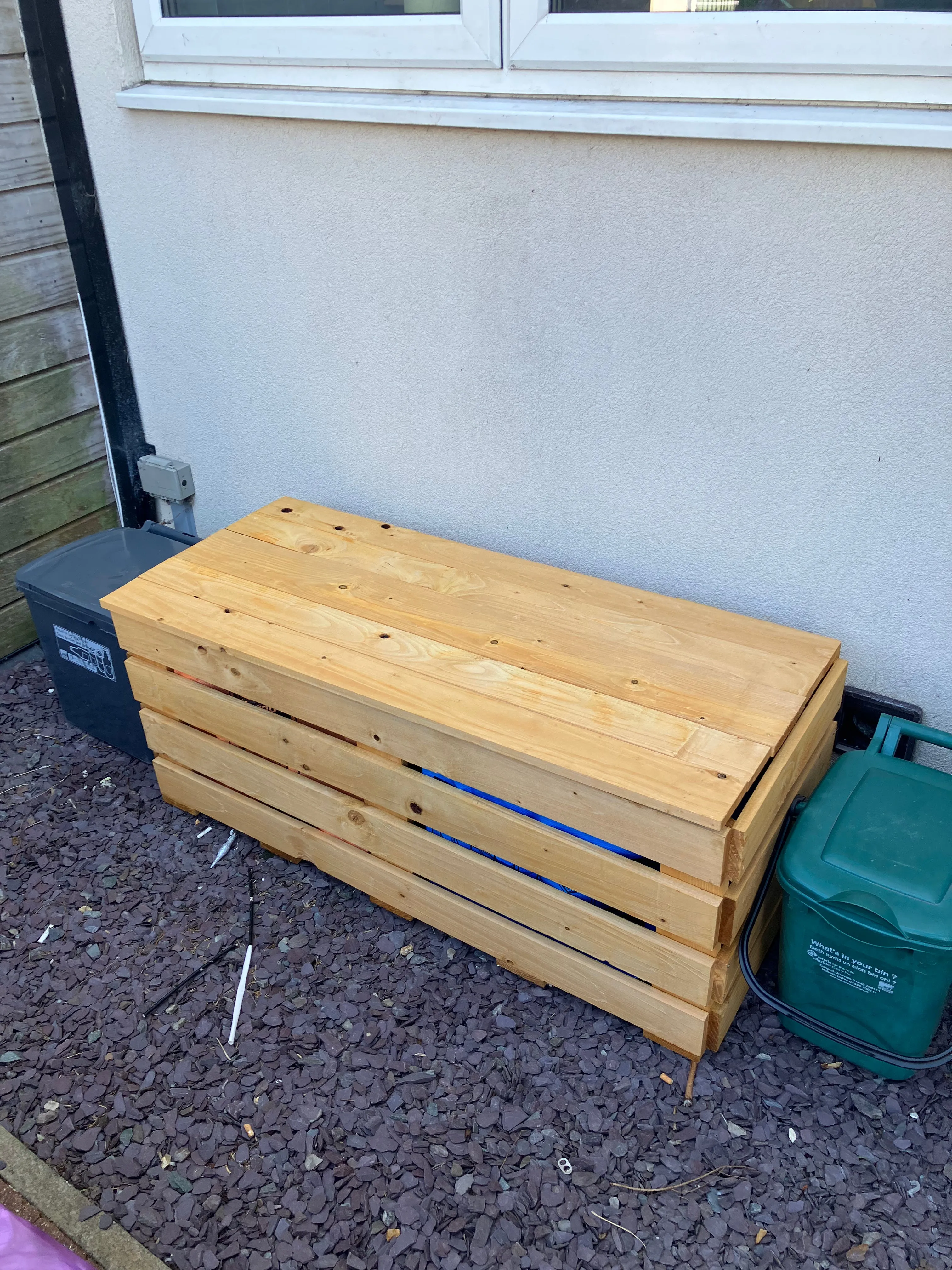 Two Slatted Recycling Storage Benches